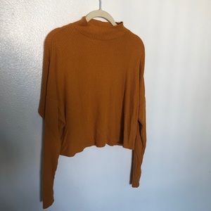 Garage burnt orange mock neck